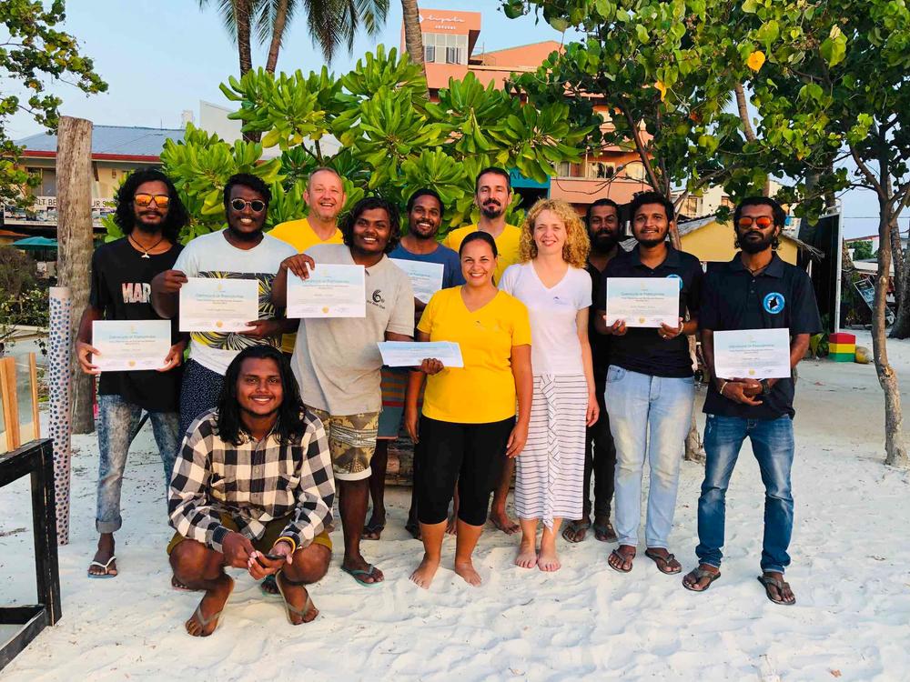Coral gardeners with their certificates after a training course